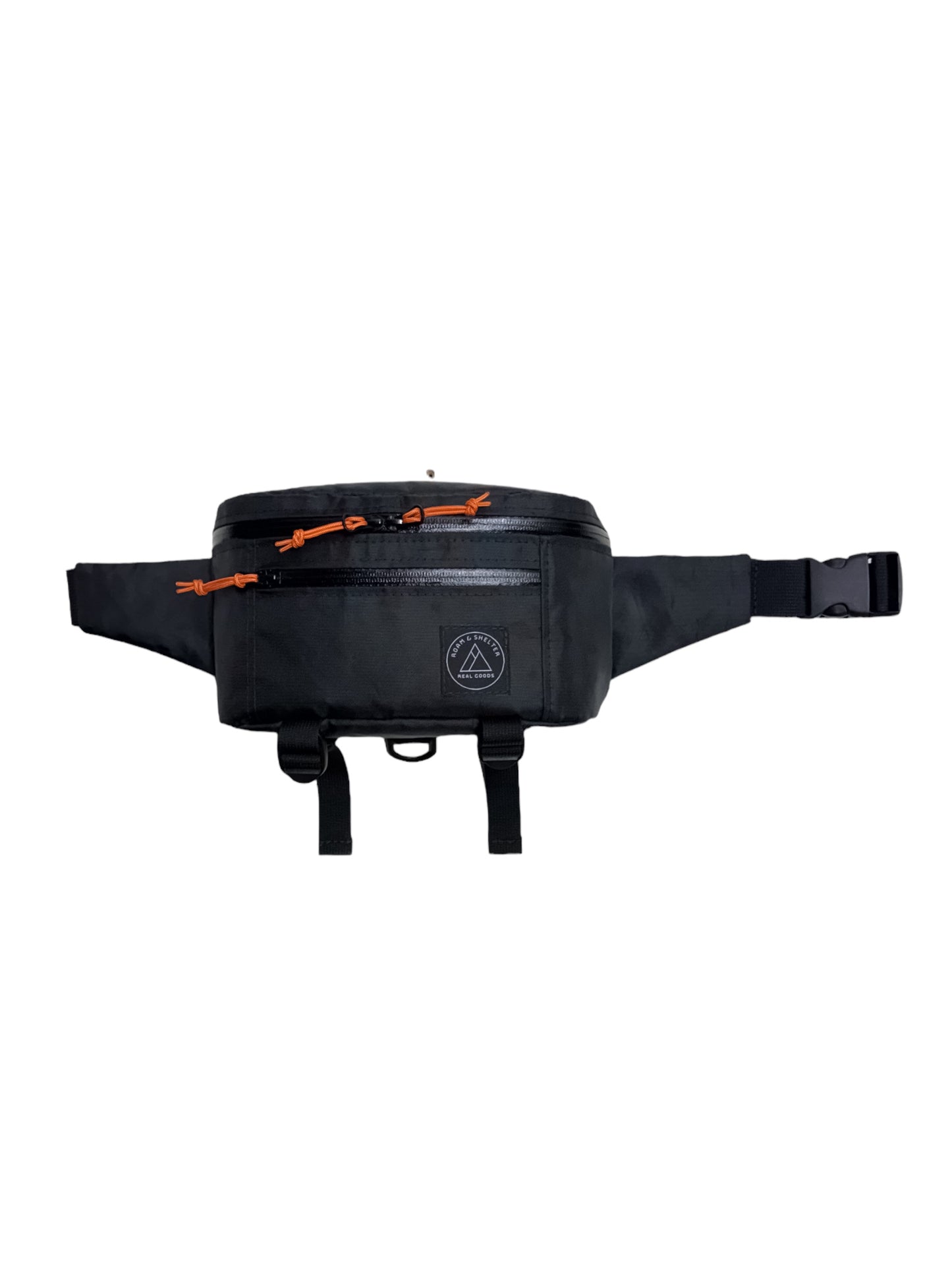 A black hip pack with dual zipper main compartment, external front pocket, and an adjustable strap. It features orange zipper pulls and additional straps for jacket storage. Handmade in Portland Oregon USA.