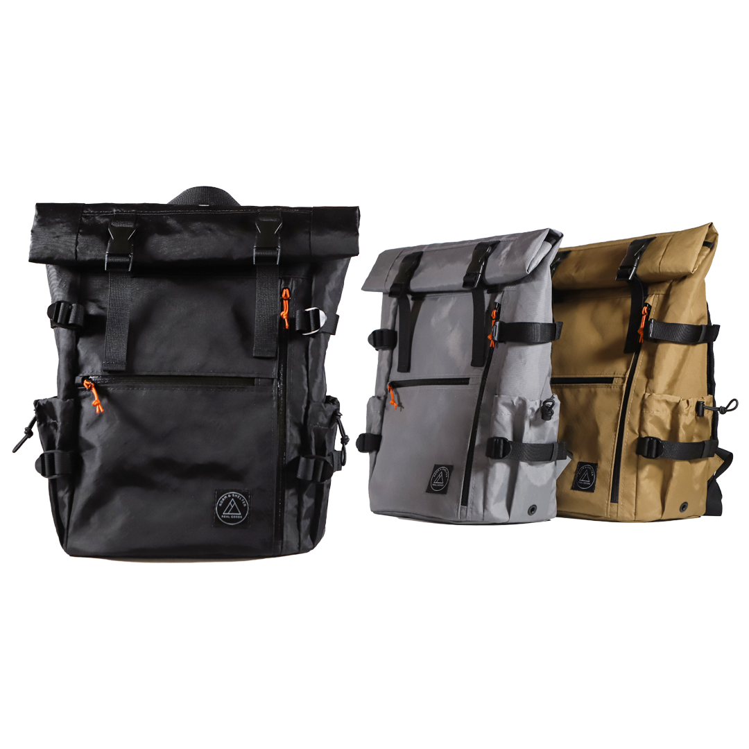 Roll top backpacks handmade in Portland Oregon USA. Fully lined, and durable. Features side water bottle pockets, two external pockets, one internal pocket, and a laptop sleeve. Quality built, adventure ready.