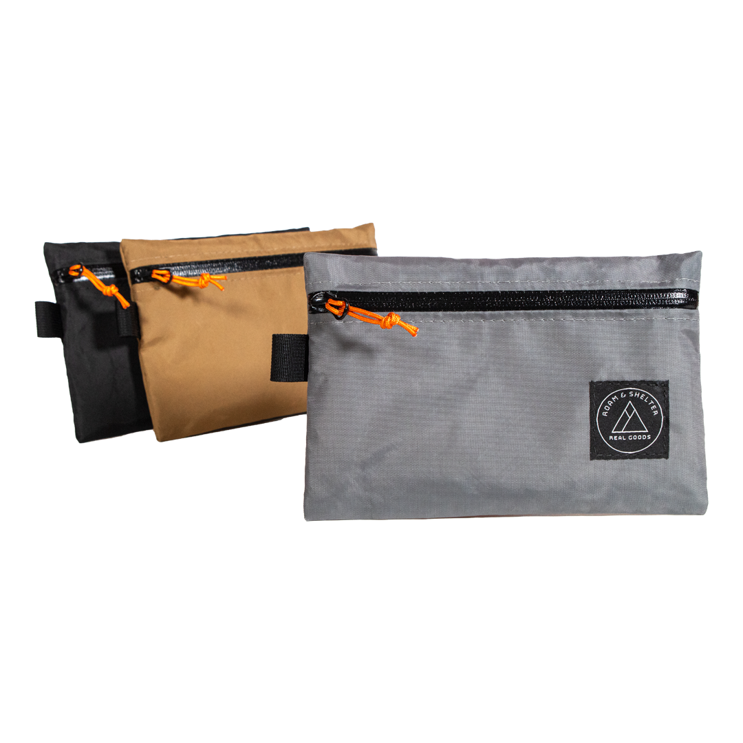 Storage pouch. Ykk AquaGuard zipper, fully lined, orange zipper pull. Perfect for a small notebook, chargers, pencils, and more. Handmade in Portland Oregon USA.